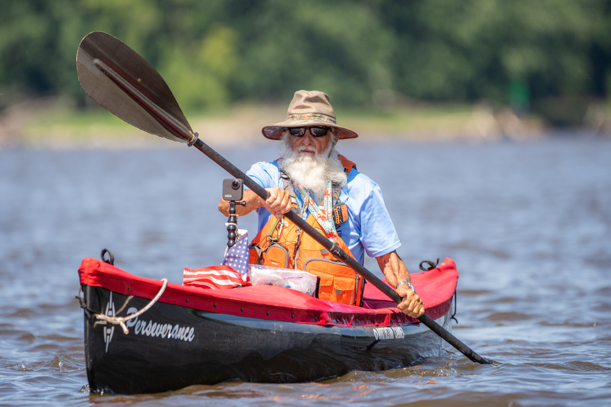 Greybeard Dale Sanders paddling on Mississippi River